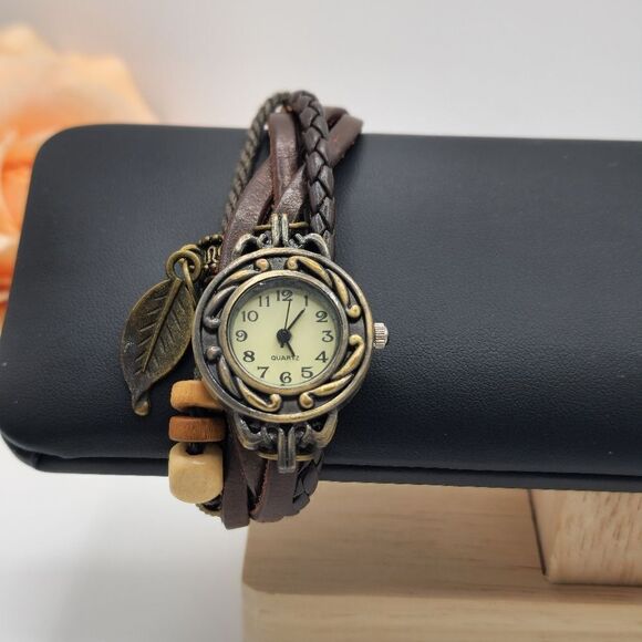 Boho braided leather feather charm wristwatch - Picture 1 of 9